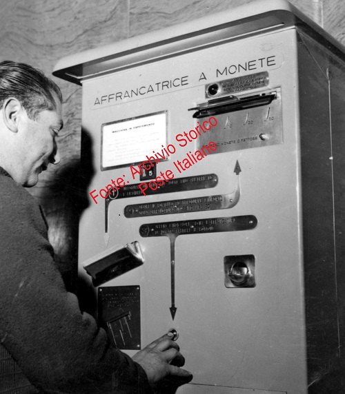 OMT - man using coin self-service machine