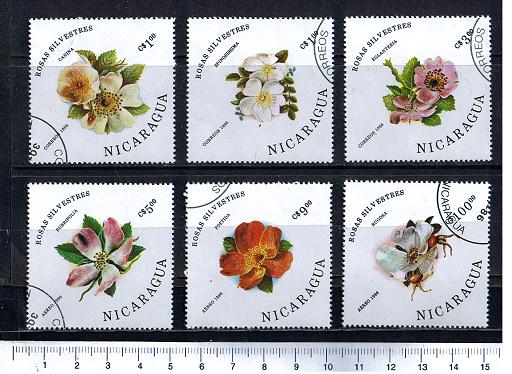 43987 - NICARAGUA	1986-446  Fiori diversi  -  7 valori serie completa timbrata .