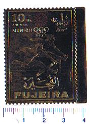 5530 - FUJEIRA (ora U.E.A.), Anno 1971, # 690 - Pre-olimpica Monaco, impresso su gold foil - 1 valore dent.  completo nuovo